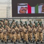 Kuwaiti soldiers from the special forces march during a military parade in Subiya